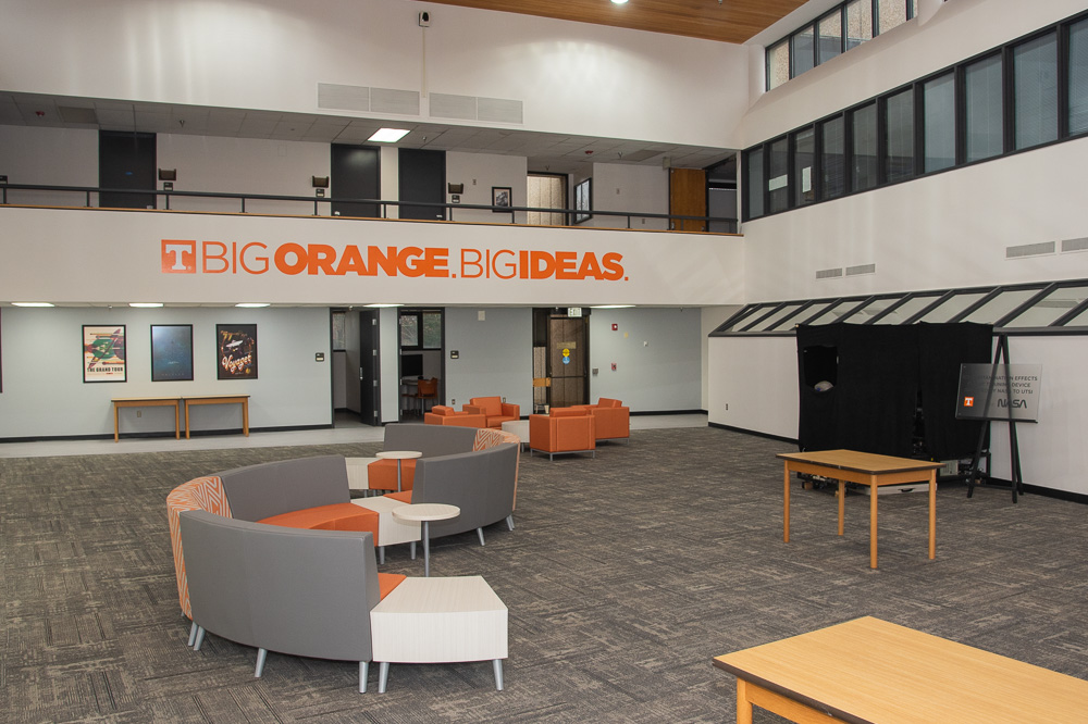 Lounge area in the Library with text "Big Orange. Big Ideas."